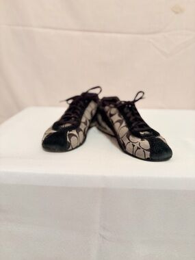 Vintage Coach Katelyn sneakers with signature monogram canvas pattern.